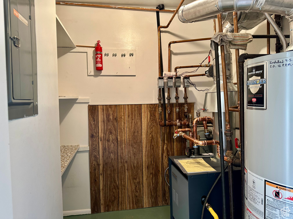 Utility room with gas water heater