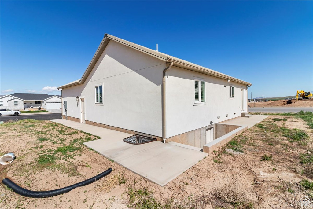 View of home's exterior with stucco siding