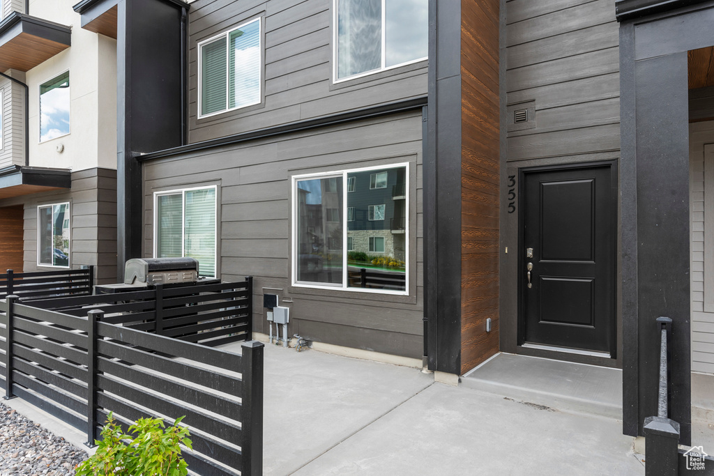 Entrance to property with a patio area