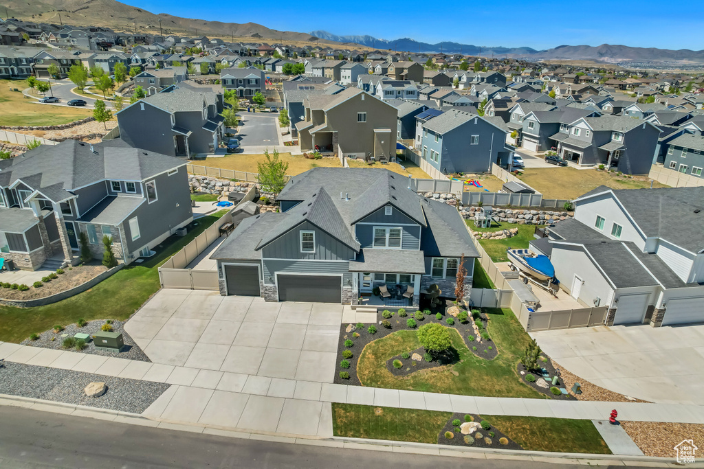 Birds eye view of property featuring a residential view and a mountain view