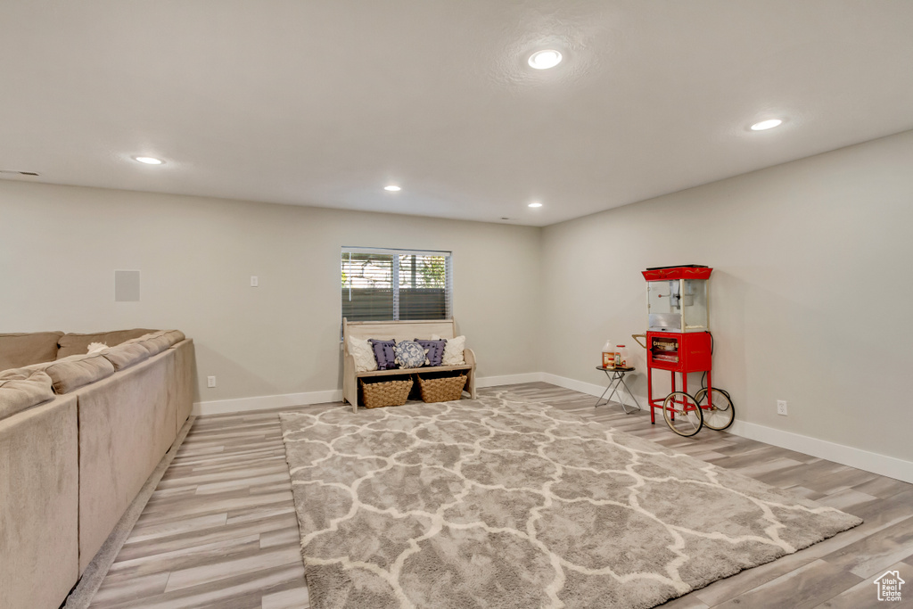 Rec room featuring recessed lighting, baseboards, and light wood-type flooring