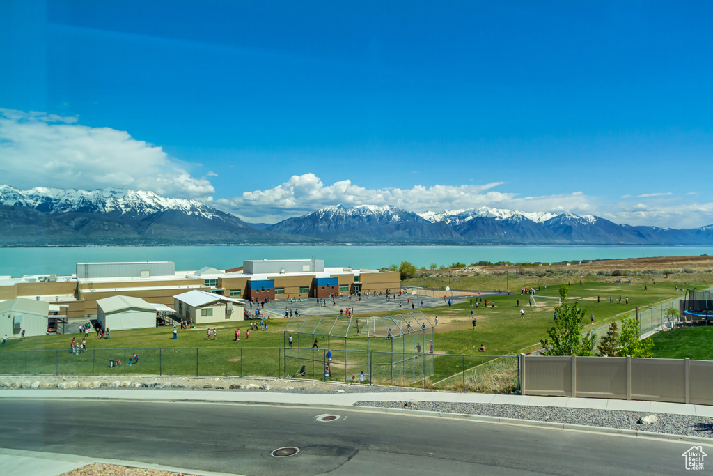 Mountain view featuring a water view