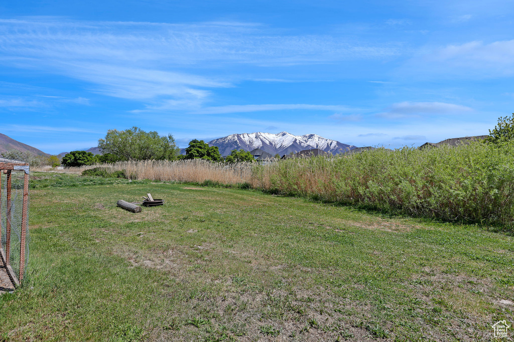View of yard featuring a mountain view