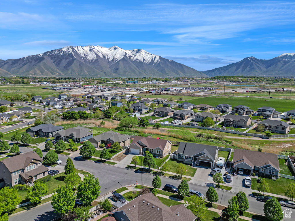 Drone / aerial view featuring a residential view and a mountain view
