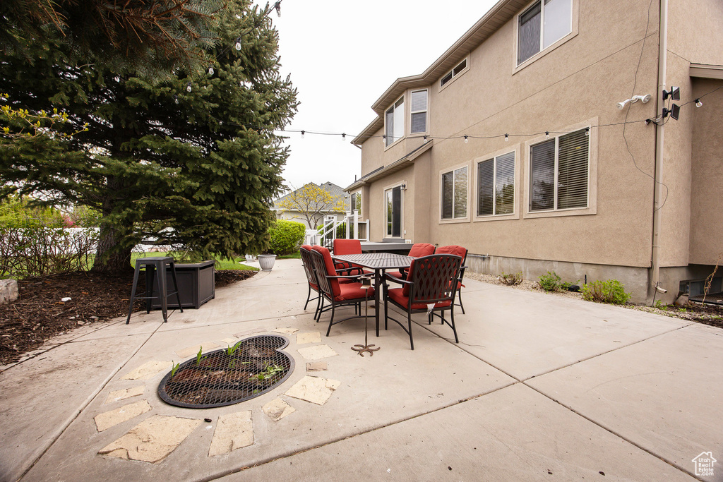 View of patio featuring outdoor dining area