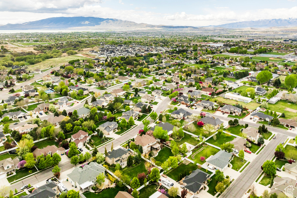 Birds eye view of property with a mountain view