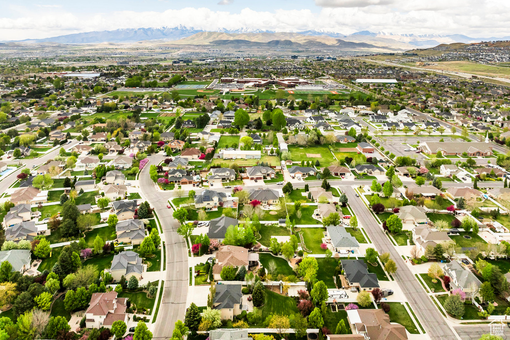 Drone / aerial view with a mountain view and a residential view