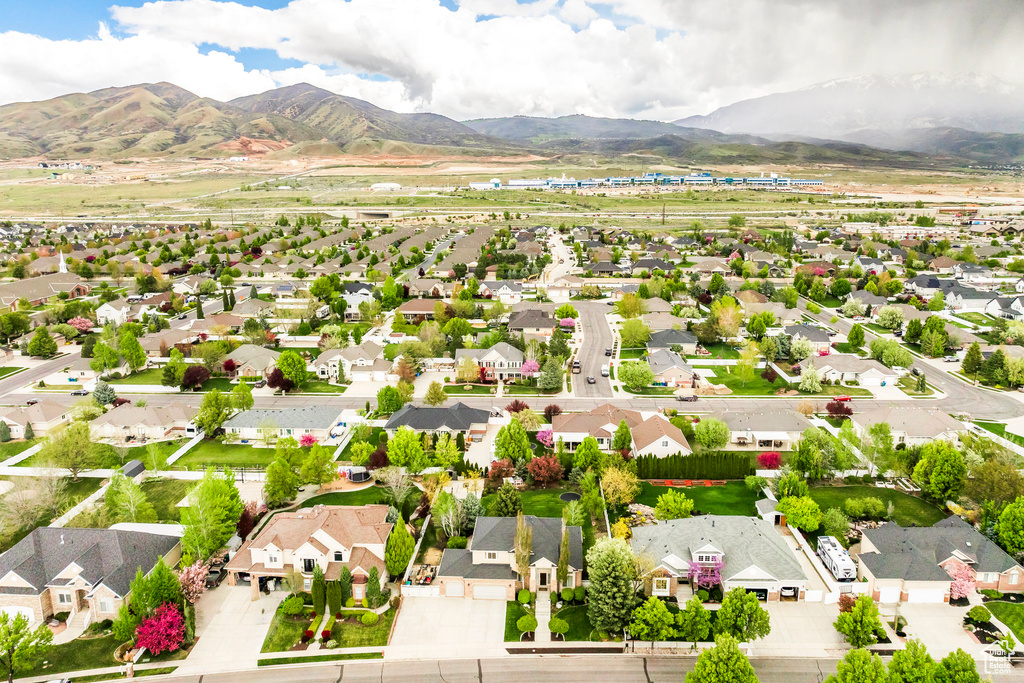 Drone / aerial view featuring a residential view and a mountain view