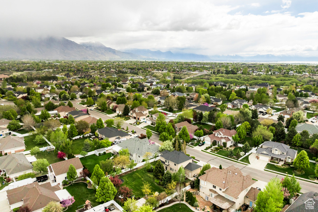 Birds eye view of property featuring a residential view and a mountain view