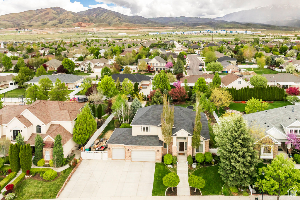 Drone / aerial view featuring a mountain view and a residential view
