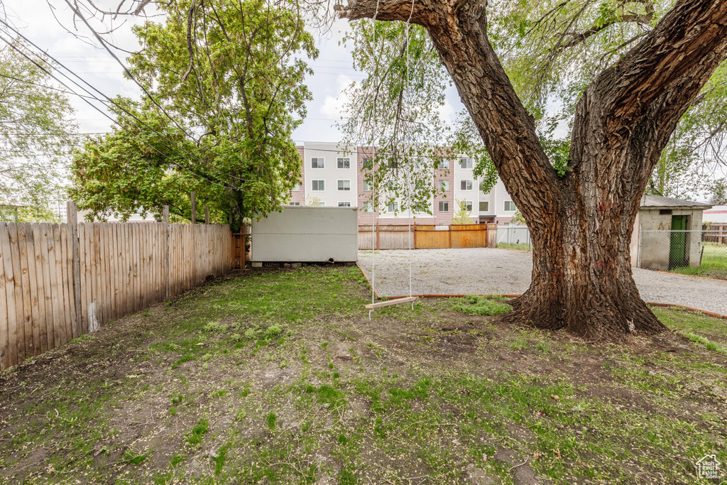 View of yard with a fenced backyard