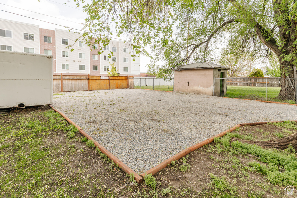 View of yard featuring a residential view and a fenced backyard