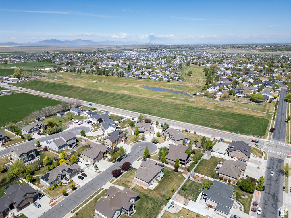 Drone / aerial view with a residential view and a mountain view