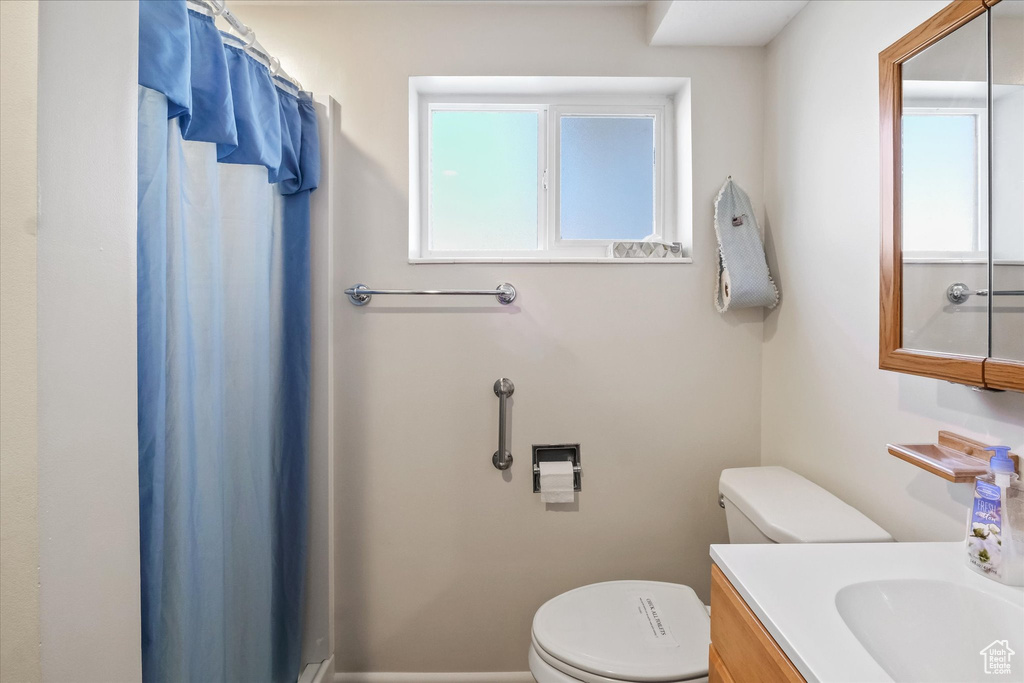 Bathroom with vanity and toilet