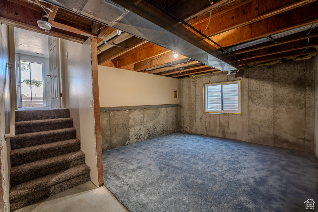 Below grade area featuring stairway