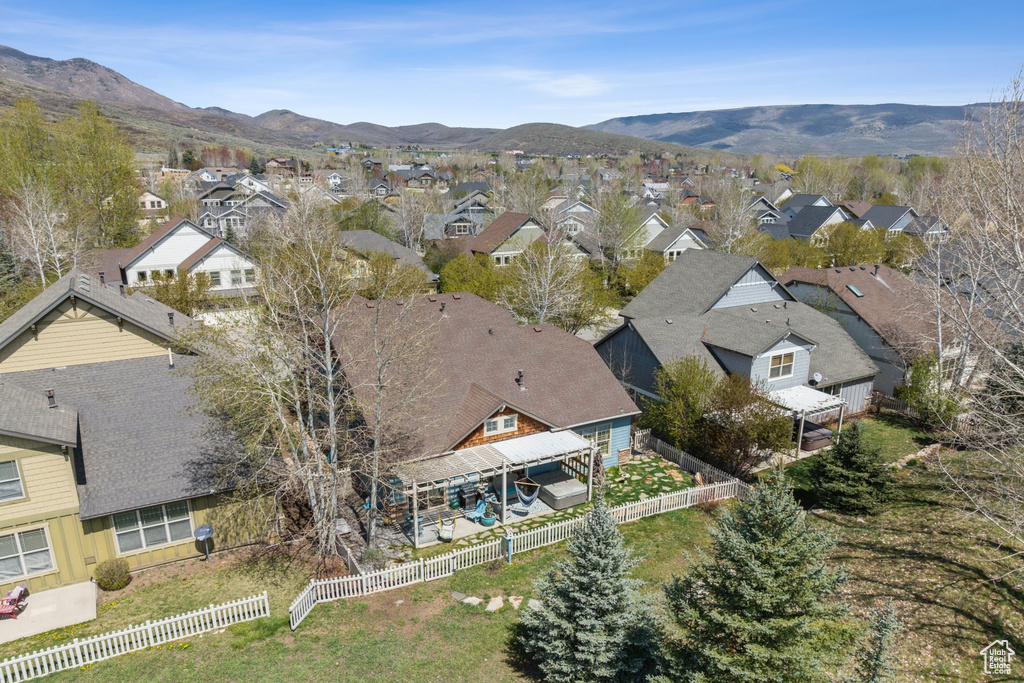 Birds eye view of property with a residential view and a mountain view