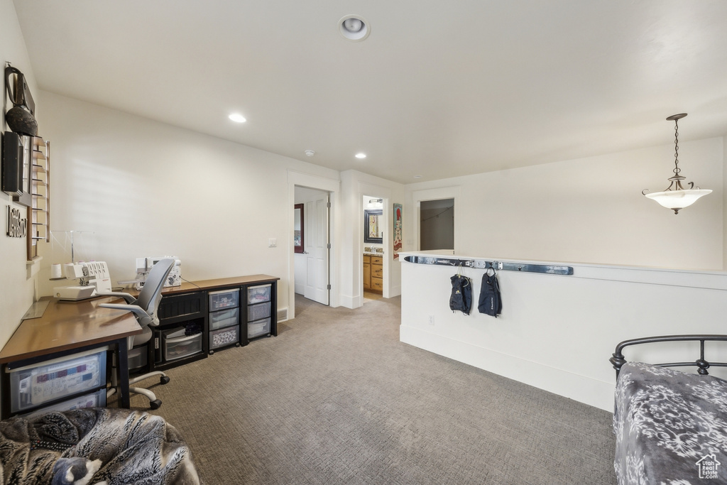 Carpeted office with recessed lighting