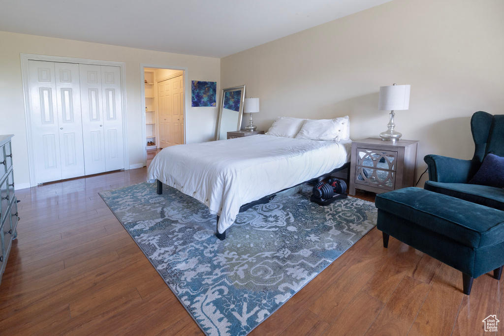 Bedroom with wood finished floors