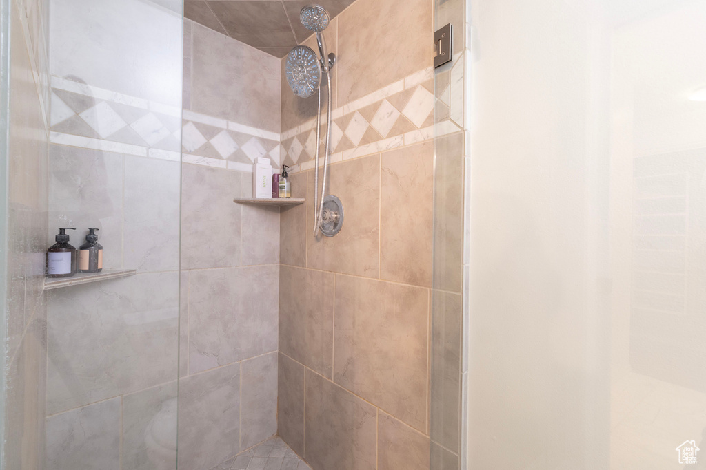 Bathroom with tiled shower