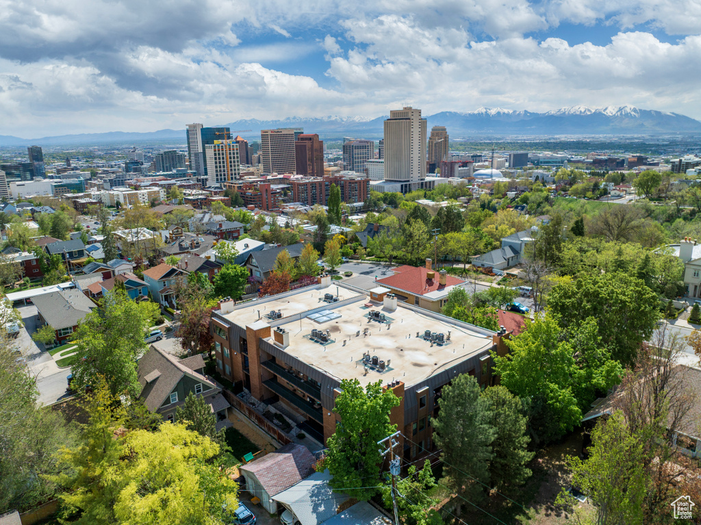 Aerial view featuring a city view and a mountain view