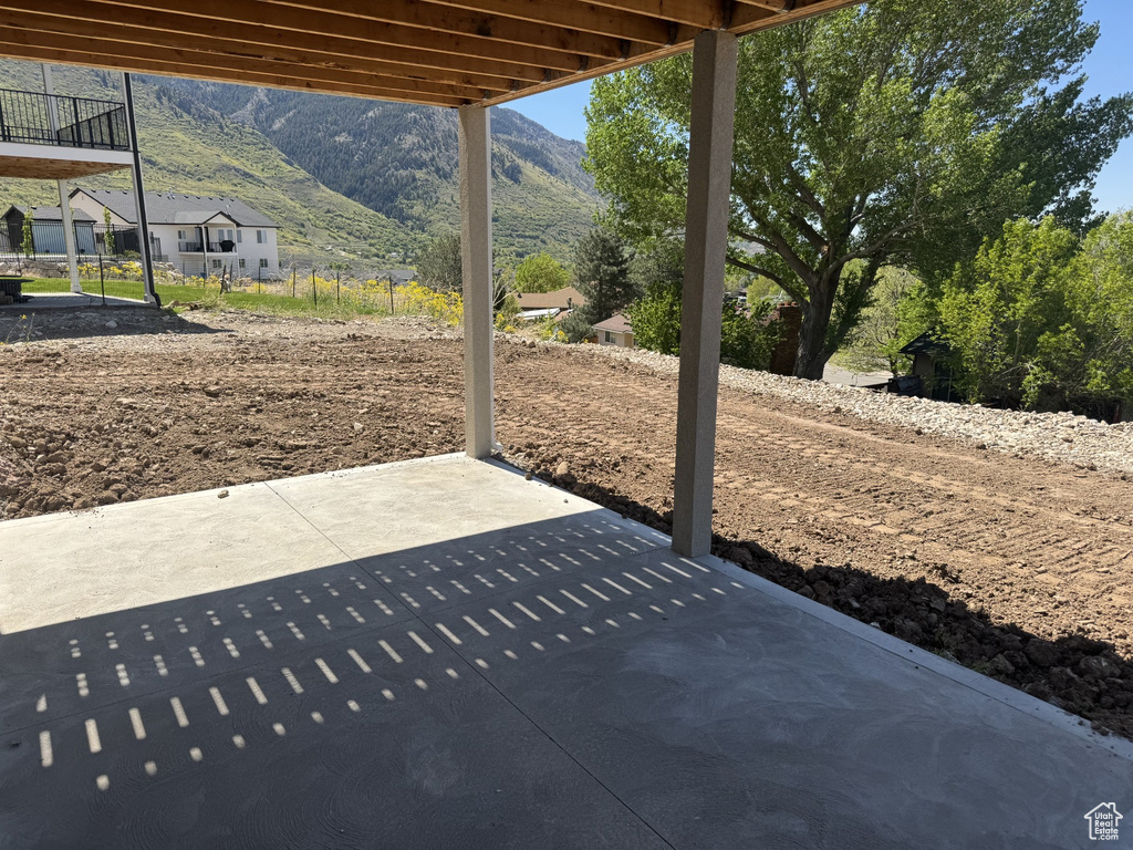 View of patio / terrace featuring a mountain view