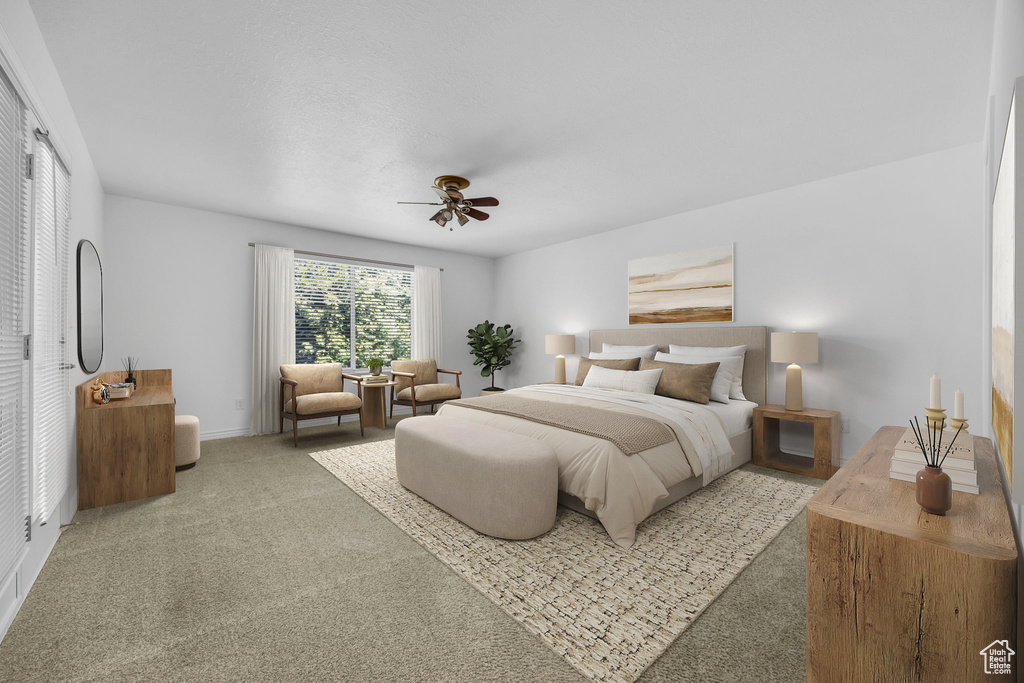 Bedroom with carpet flooring, ceiling fan, and baseboards