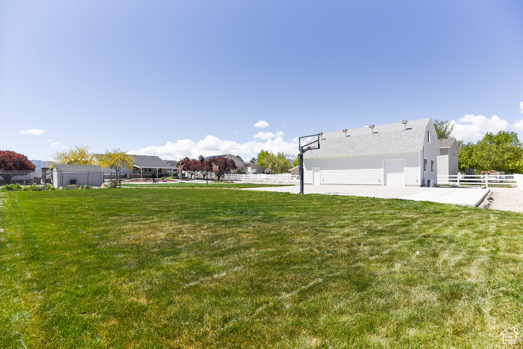 View of yard with fence