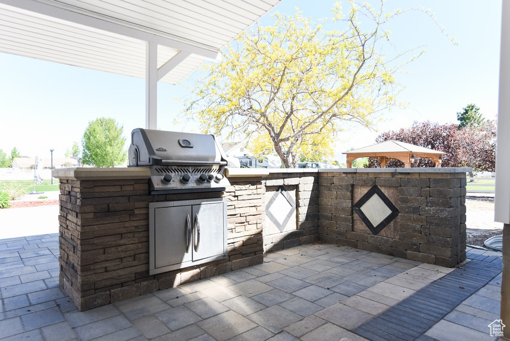 View of patio featuring grilling area and area for grilling