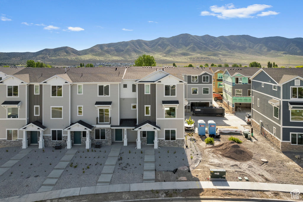 Birds eye view of property featuring a residential view and a mountain view