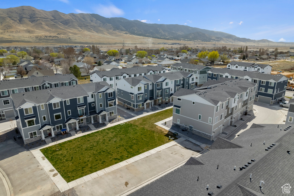 Drone / aerial view featuring a mountain view and a residential view