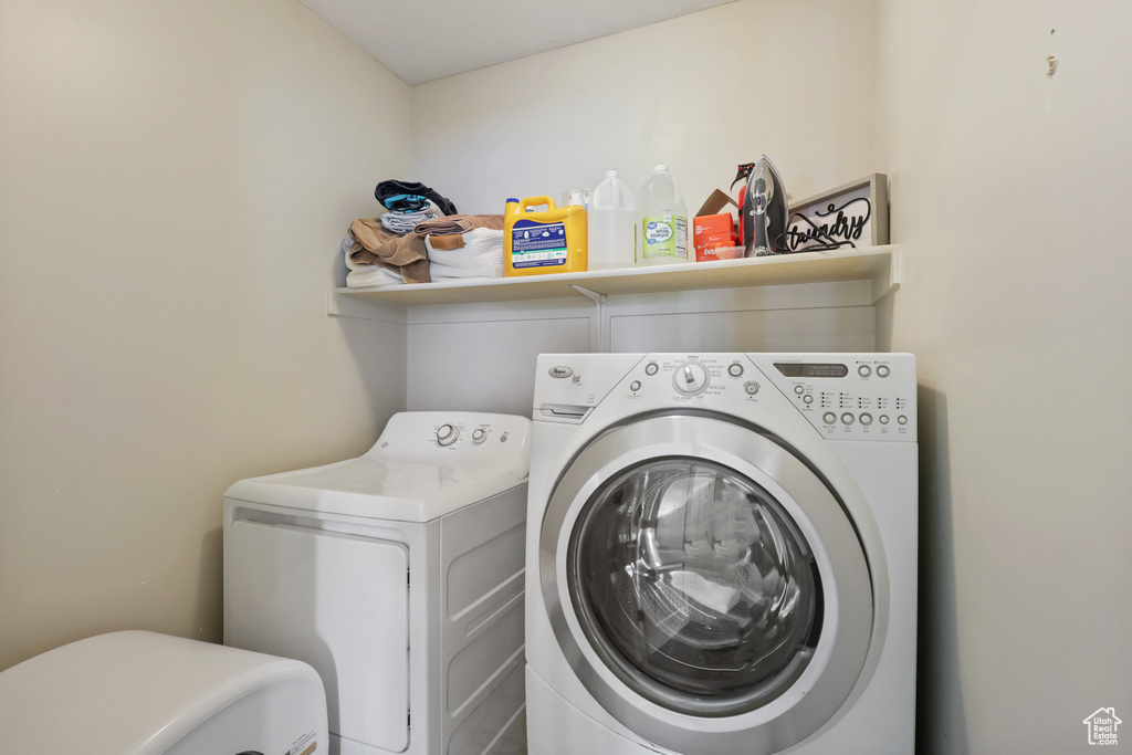 Laundry area featuring laundry area and independent washer and dryer