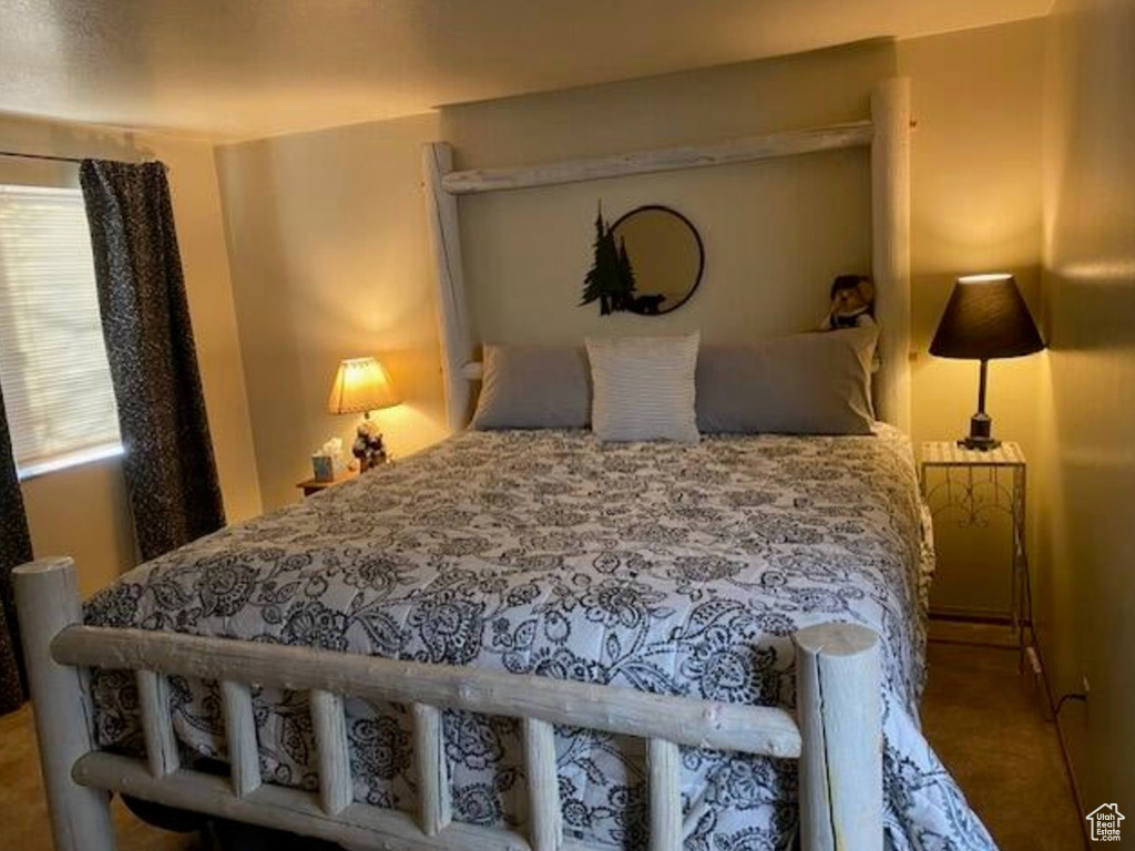 Bedroom with carpet