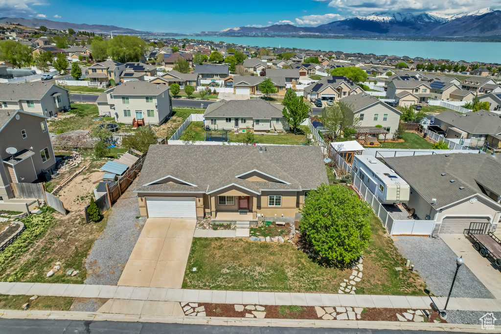 Bird's eye view with a water and mountain view and a residential view