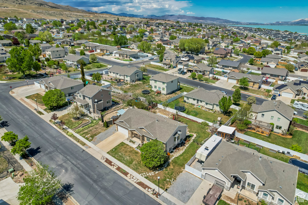 Drone / aerial view with a residential view and a mountain view