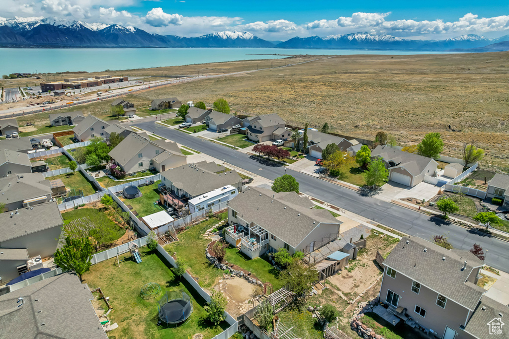 Aerial view featuring a water and mountain view and a residential view