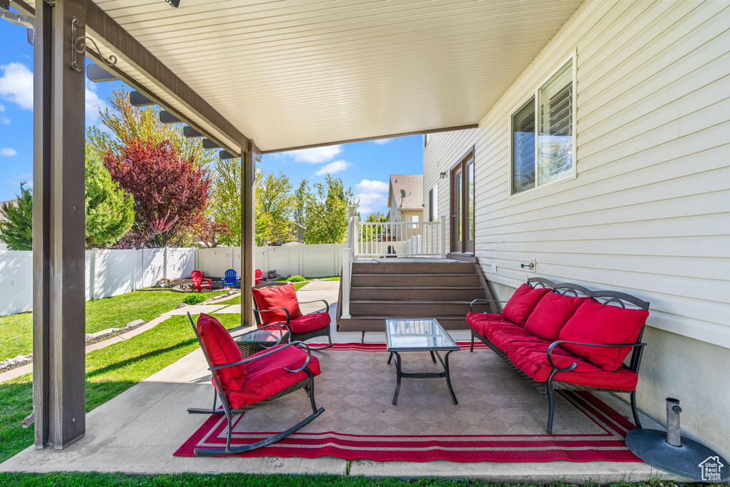 View of patio / terrace featuring a fenced backyard and an outdoor living space