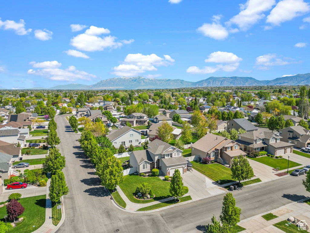 Drone / aerial view with a residential view and a mountain view