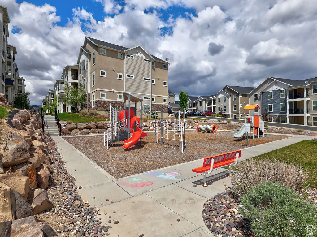 Community jungle gym featuring a residential view