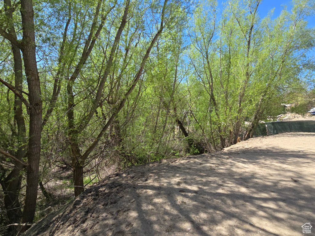 Exterior space featuring a view of trees