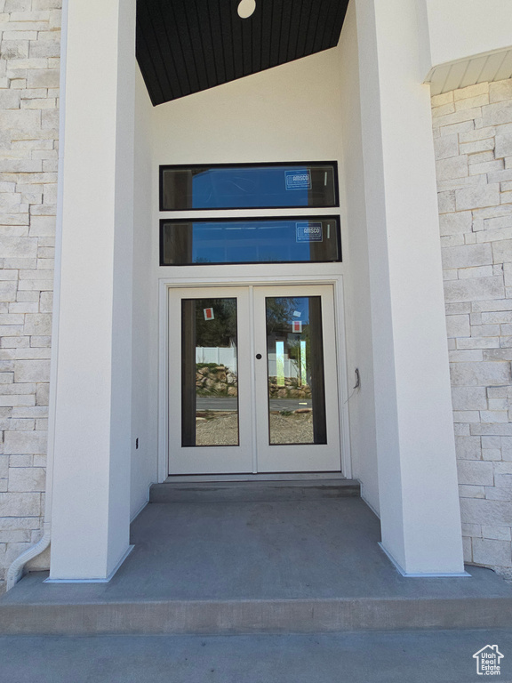 Doorway to property featuring french doors