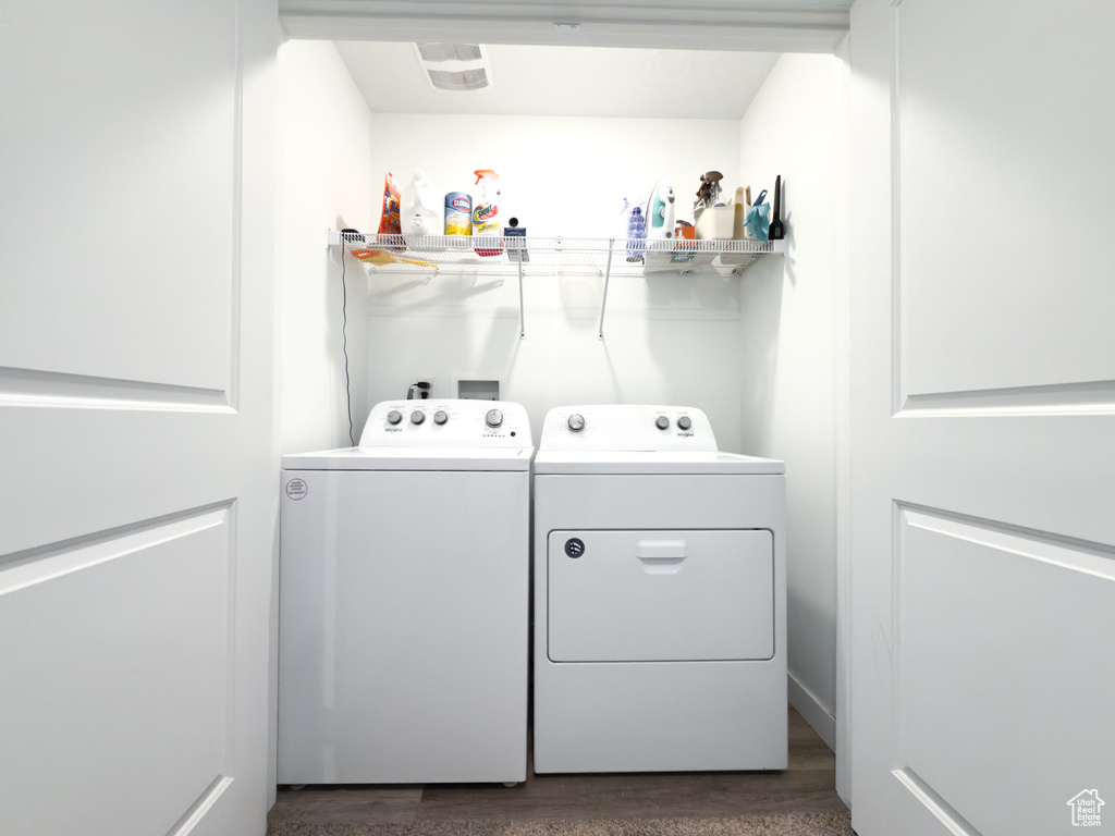 Washroom with laundry area and washer and dryer