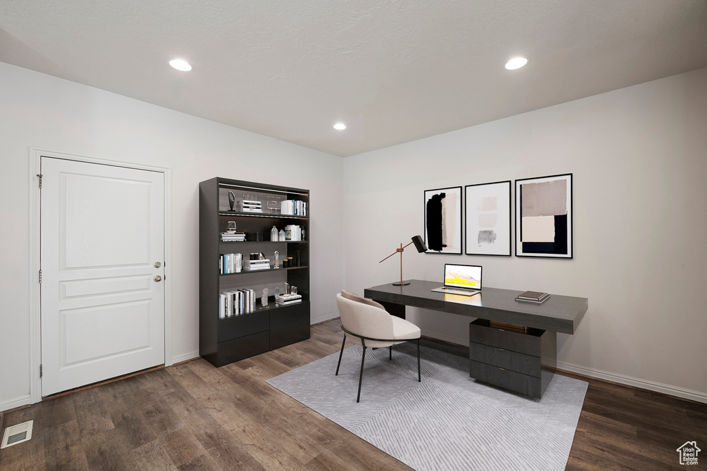 Office area with recessed lighting, visible vents, baseboards, and dark wood finished floors
