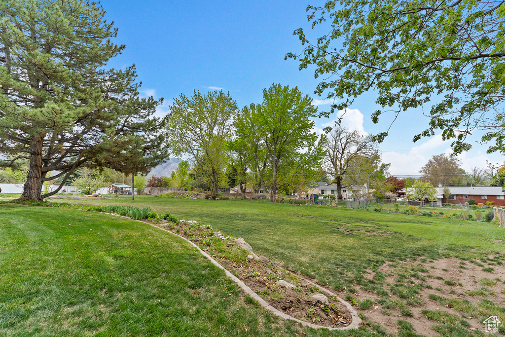 View of yard with fence