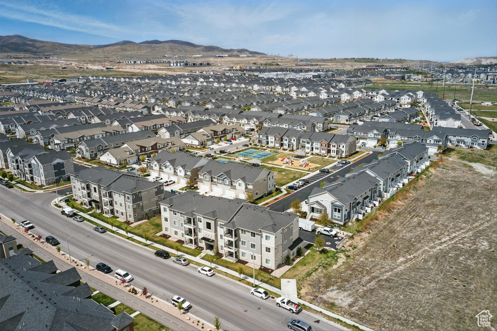 Aerial view featuring a mountain view and a residential view