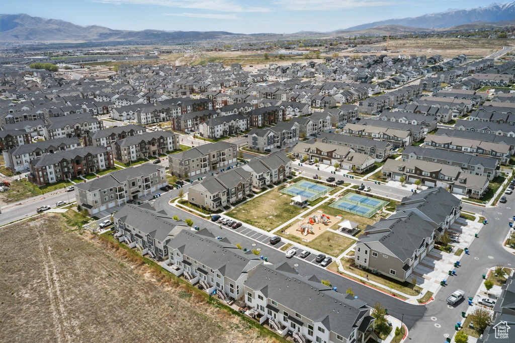 Drone / aerial view featuring a mountain view and a residential view