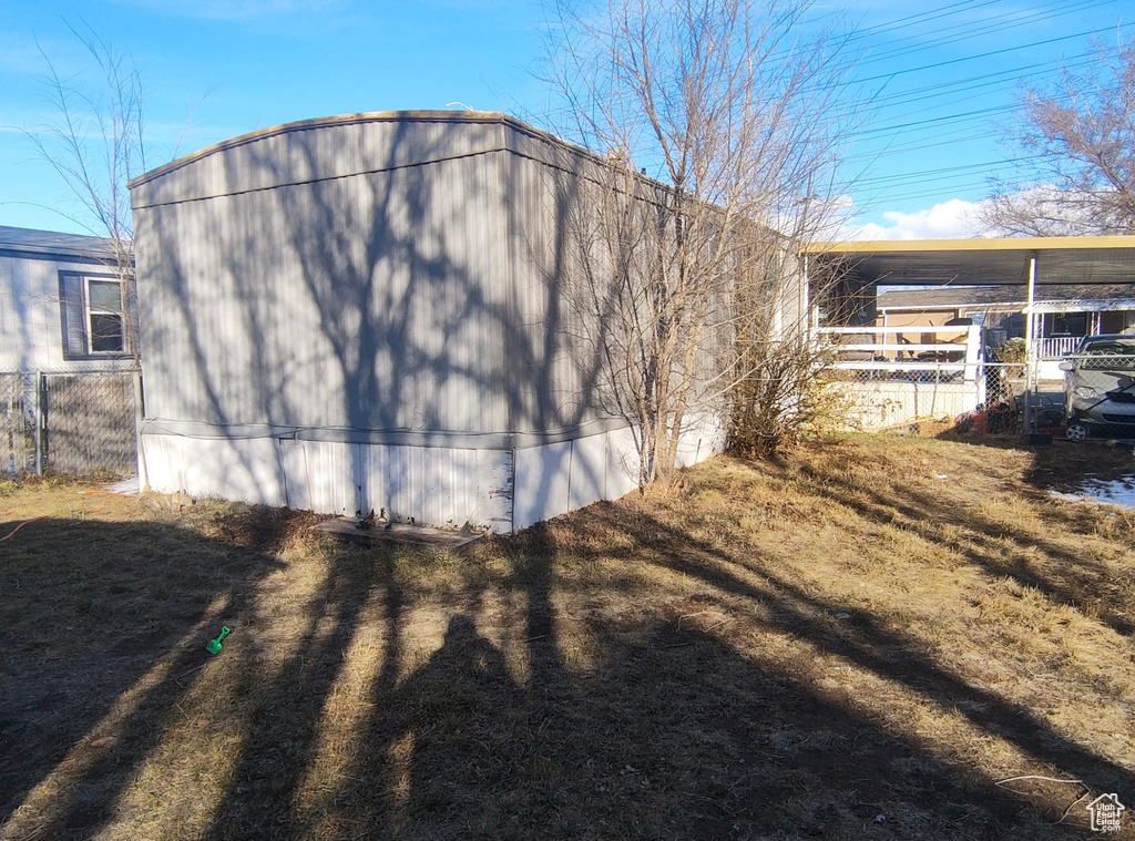 View of outdoor structure with fence
