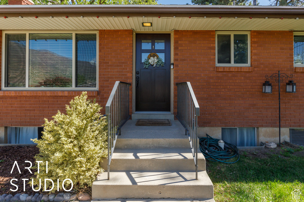 Property entrance with brick siding