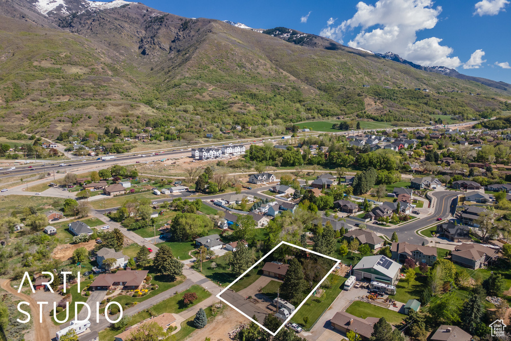 Birds eye view of property featuring a residential view and a mountain view