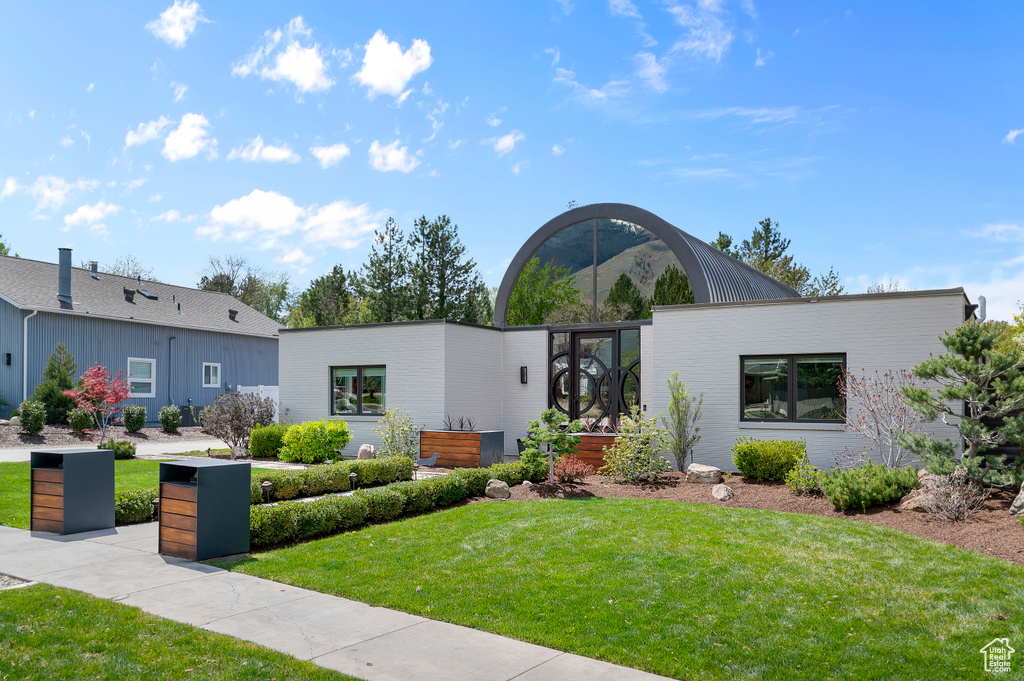 View of front of home with a front lawn
