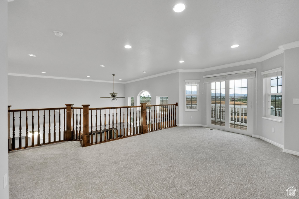 Unfurnished room with carpet floors, a ceiling fan, baseboards, and recessed lighting